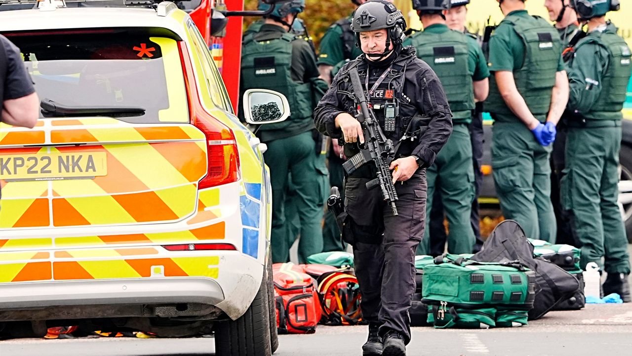 An armed police officer at the scene of a stabbing incident at Heaton Park Hebrew Congregation synagogue, in Crumpsall, Manchester, England, Thursday Oct. 2, 2025. (Peter Byrne/PA via AP)