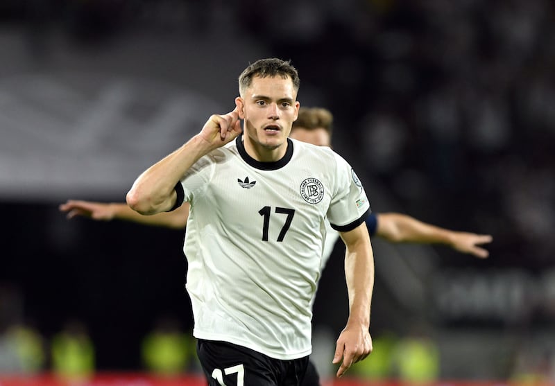 Florian Wirtz celebrates scoring Germany’s third