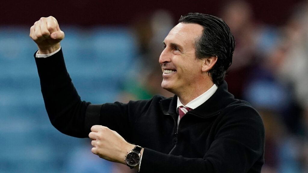 Aston Villa manager Unai Emery punches the air in happiness.