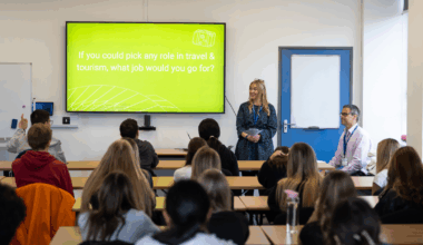 Mollie speaking at college event