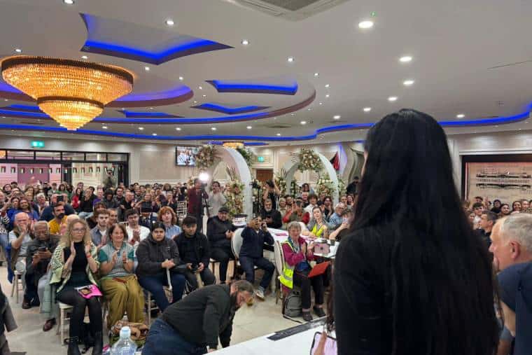 Photo of Zarah Sultana addressing the rally in Leeds
