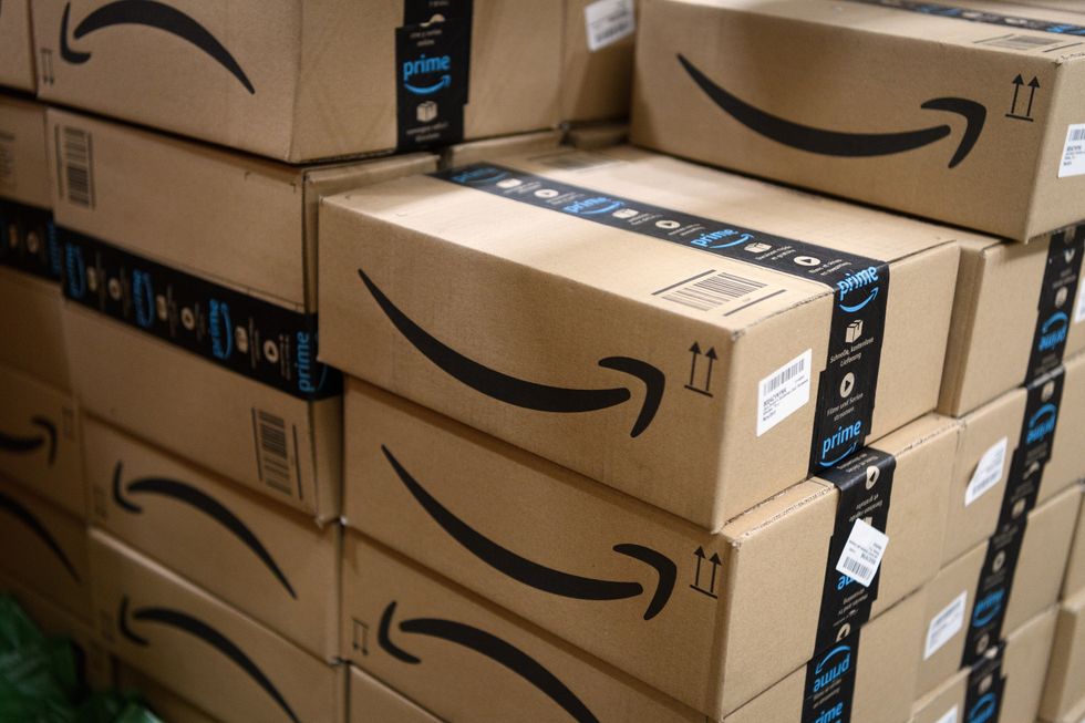 a pile of boxes with Amazon Prime branding