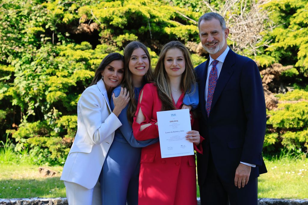 LLANTWIT MAJOR, WALES - MAY 20: In this handout image provided by the Spanish Royal Household, King Felipe VI of Spain (R), Queen Letizia of Spain (L), Crown Princess Leonor of Spain (2R) and Princess Sofia of Spain (2L) attend the graduation of Princess Leonor of Spain at the UWC Atlantic College  on May 20, 2023 in Llantwit Major, Gales, United Kingdom. The graduation ceremony, known as the "Leavers celebration," marked the end of Princess Leonor's two-year stay in Wales. (Photo by Handout/Spanish Royal Household via Getty Images)