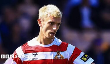 Zain Westbrooke playing for Doncaster last season, with bleach blond hair