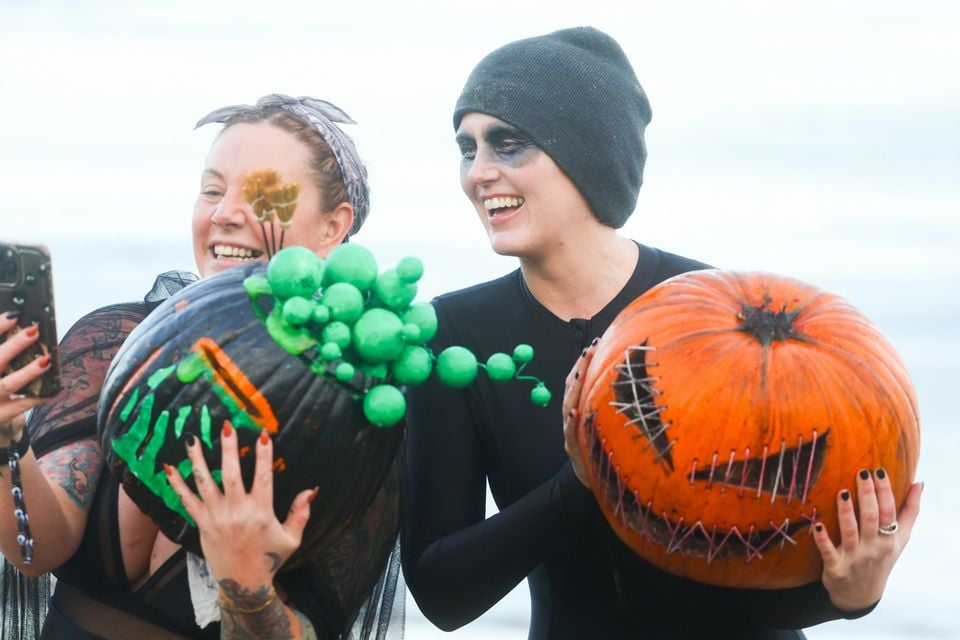 The annual Pumpkin Head Swim at Helen's Bay, Co Down, in aid of Action Mental Health took place on Sunday. Pic: Presseye