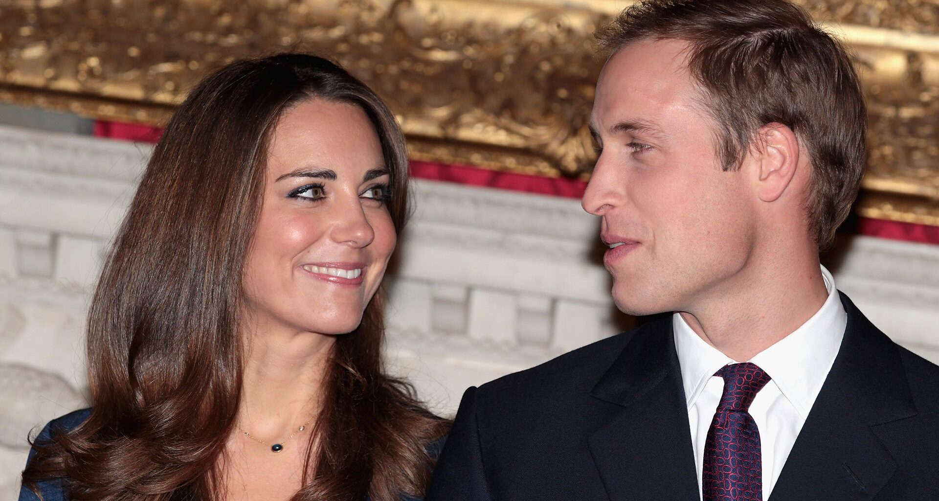 LONDON, ENGLAND - NOVEMBER 16: Prince William and Kate Middleton pose for photographs in the State Apartments of St James Palace on November 16, 2010 in London, England. After much speculation, Clarence House today announced the engagement of Prince William to Kate Middleton. The couple will get married in either the Spring or Summer of next year and continue to live in North Wales while Prince William works as an air sea rescue pilot for the RAF. The couple became engaged during a recent holiday in Kenya having been together for eight years. (Photo by Chris Jackson/Getty Images)