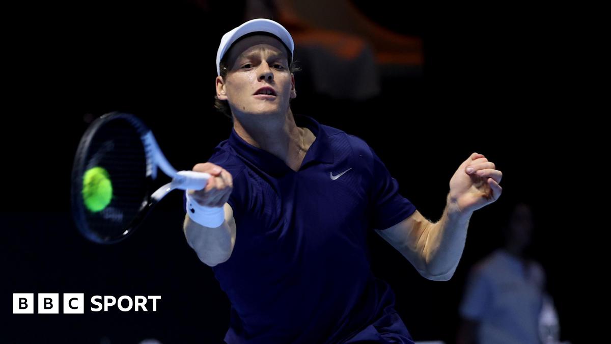 Jannik Sinner plays a forehand