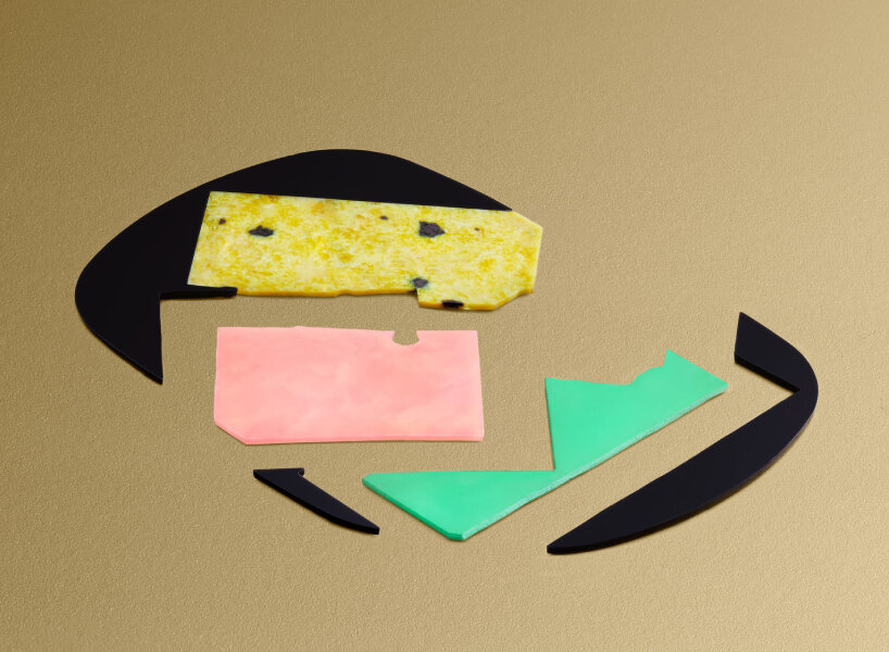 the craftsmen add thin slices of Namibian serpentine, pink opal, and chrysoprase