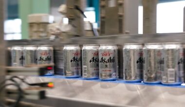 Cans of Asahi Super Dry beer move on the production line inside the Asahi Breweries Ibaraki plant, operated by Asahi Breweries Ltd., a unit of Asahi Group Holdings Ltd., in Moriya, Ibaraki Prefecture, Japan, on Tuesday, April 25, 2023.