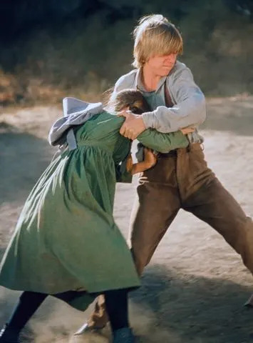 NBCU Photo Bank/NBCUniversal via Getty Melissa Gilbert (left) and Michael LeClair in the 'Little House on the Prairie' episode 'Bully Boys'