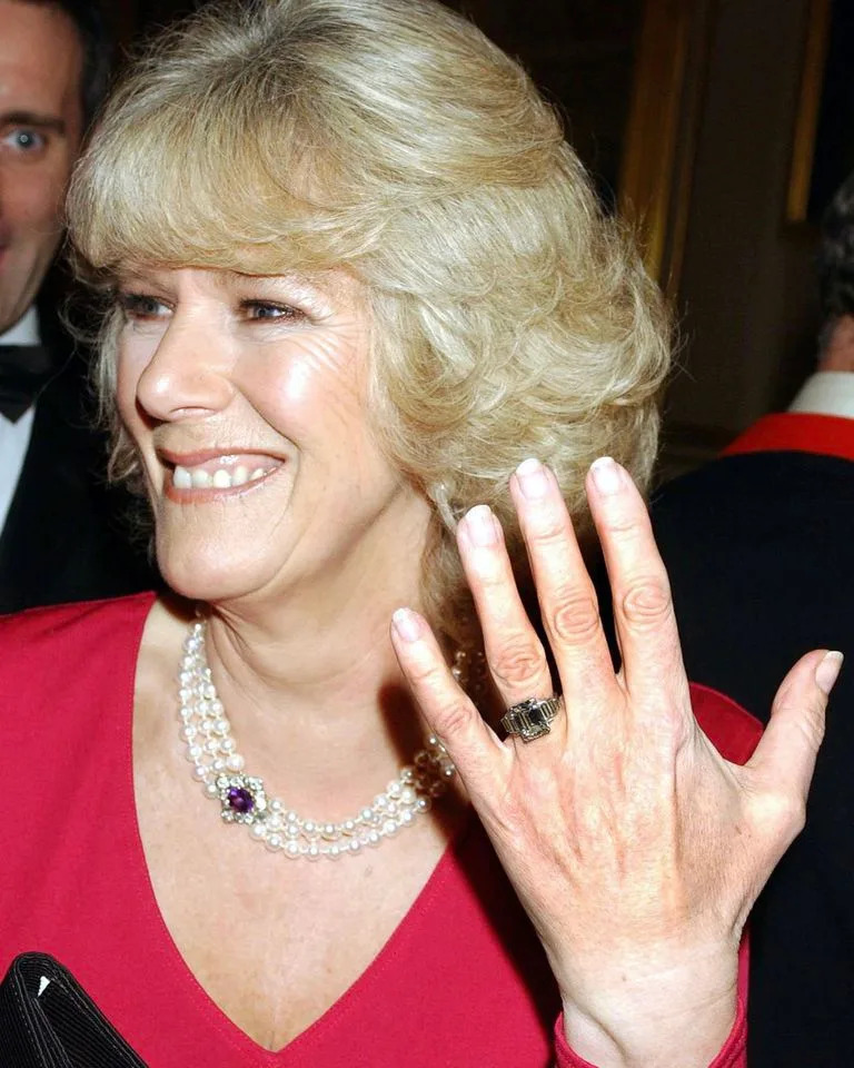 Anwar Hussein/WireImage Camilla Parker Bowles (now Queen Camilla) showing her engagement ring in February 2005.