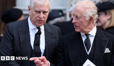 Prince Andrew and King Charles, dressed in black mourning clothes, at the funeral of the Duchess of Kent