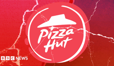 Pizza Hut logo on cracked red background