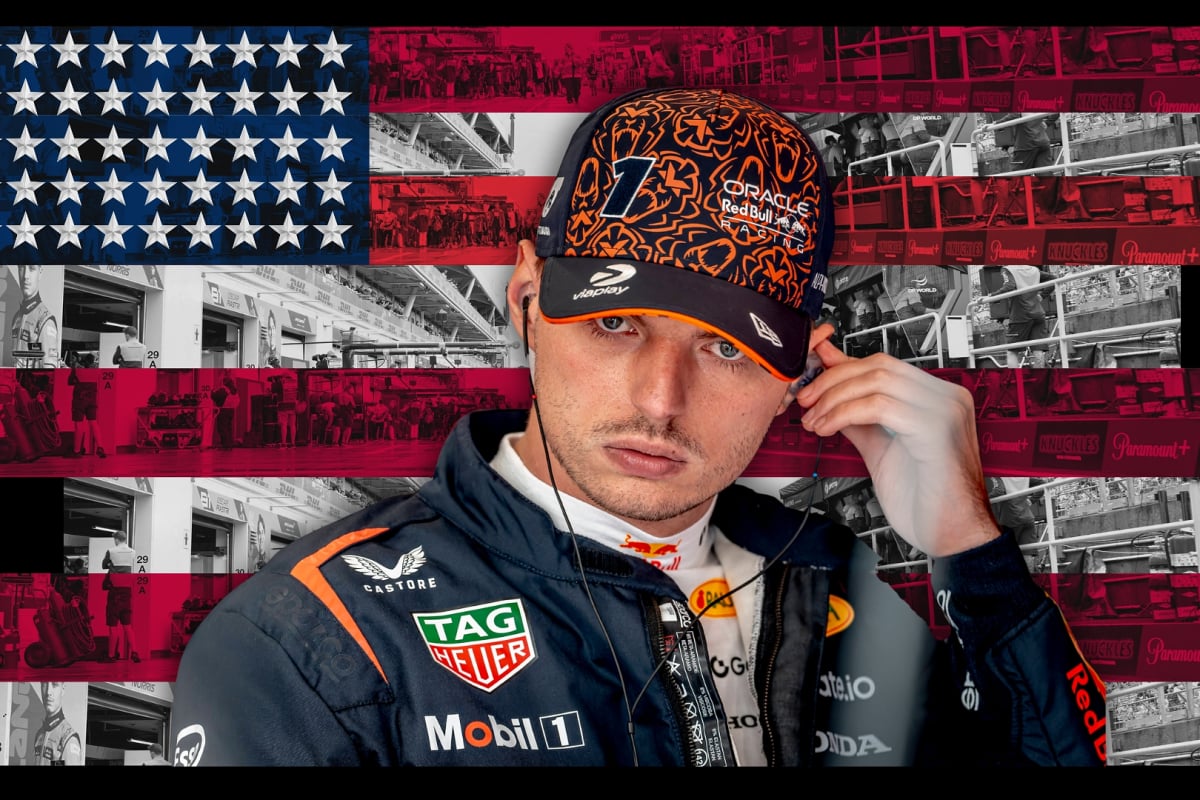 Verstappen looking concentrated as he puts an earphone in with a US-flag themed background