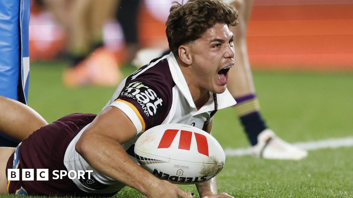 Brisbane Broncos full-back Reece Walsh with a medal around his neck