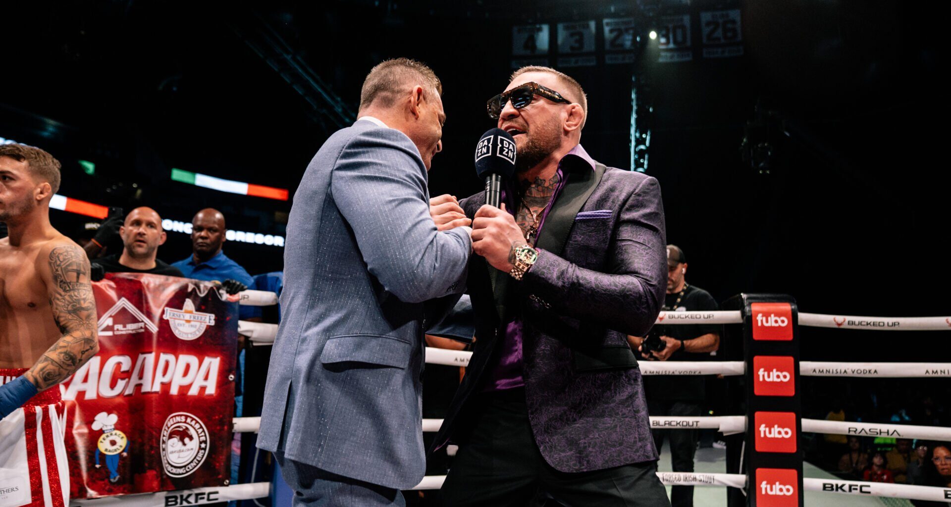Conor McGregor and Dave Feldman embrace at BKFC 82
