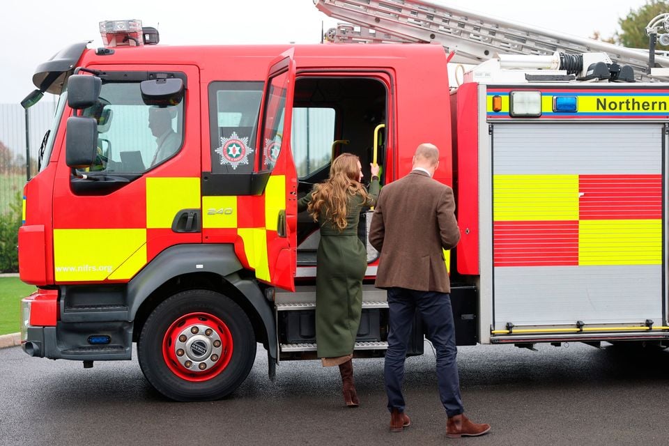 William and Kate board a fire engine at the centre near Cookstown. Chris Jackson/PA Wire