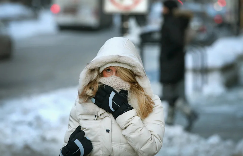 A commuter makes a sub-zero trek through the Loop on January 6, 2014, in Chicago, Illinois, as the polar vortex takes hold on the U.S.