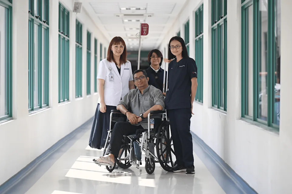(From left) Ms Lim Chia Wei, principal genetic counsellor at Tan Tock Seng Hospital (TTSH) Centre for Precision and Genomic Medicine; General worker Mohamad Shahrel Hamid; his daughter Nurul Naqisyah; and and Dr Lim Xin Rong, Senior Consultant, Department of Rheumatology, Allergy and Immunology at TTSH.