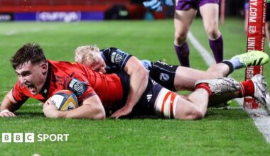 Ruadhan Quinn celebrates scoring a try