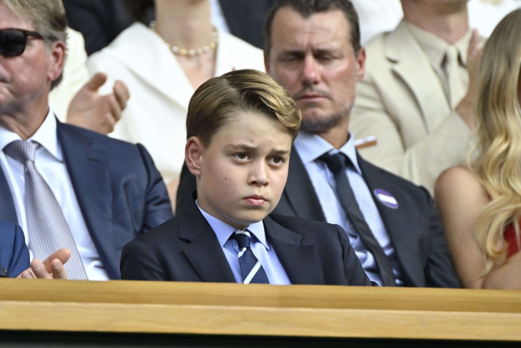 Prince George with a serious expression at Wimbledon
