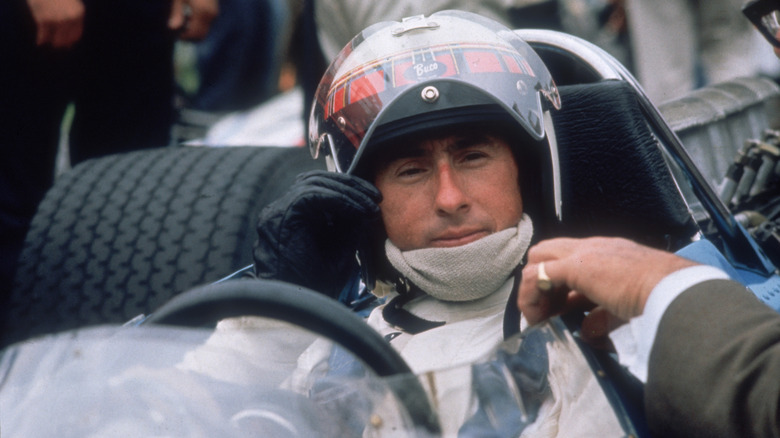 A young Jackie Stewart in his BRM car