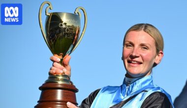 Jamie Melham creates Caulfield Cup history after riding Half Yours to victory