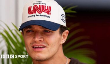 A close-up image of McLaren's Lando Norris wearing a cap at the United States Grand Prix