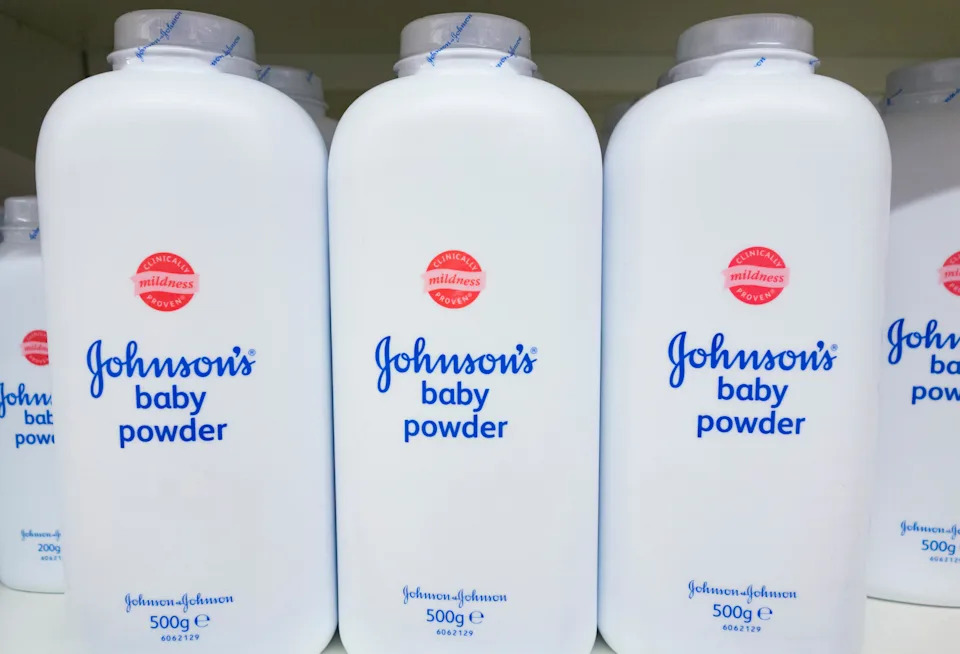 Johnson`s baby powder on supermarket shelf. UK