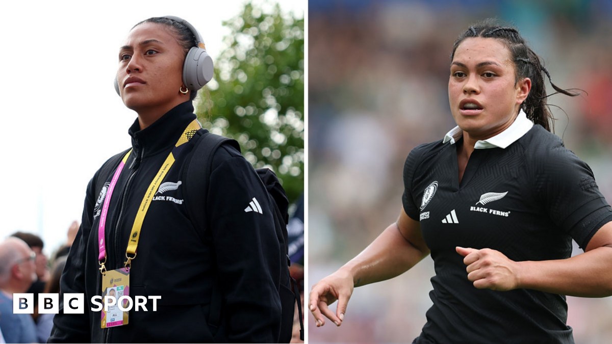 Liana Mikaele-Tu'u dressed in New Zealand-branded black training top, yellow and pink lanyard and grey headphones