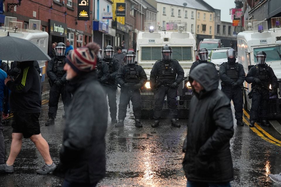 Police during disturbances in Portadown over the summer