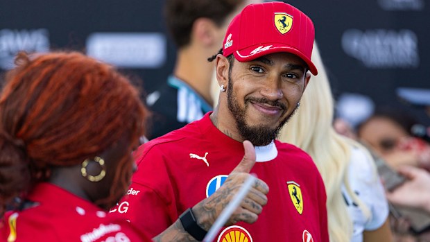 Lewis Hamilton gives a thumbs up in the media pen during the F1 Grand Prix of United States.