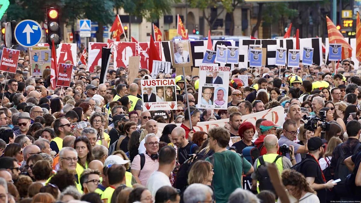 Tens of thousands protest a year after deadly floods