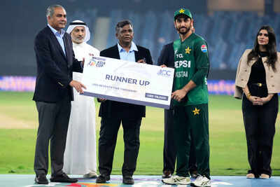 Pakistan's captain Salman Agha receives the runner up award after India won the Asia Cup (AP/PTI) A new low in Dubai as Pakistan captain Salman Agha throws his cheque in anger