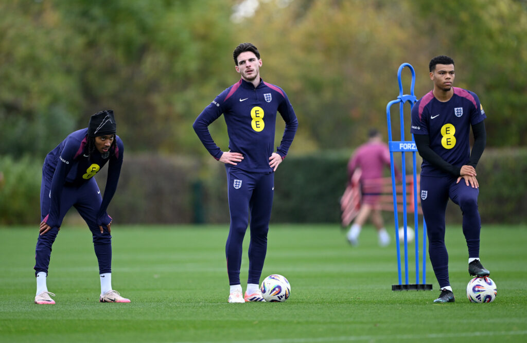 Declan Rice: England are building something 'really really special' 3 ENFIELD, ENGLAND - OCTOBER 13: Djed Spence, Declan Rice and Dane Scarlett of England look on during a training session at Tottenham Hotspur Training Centre on October 13, 2025 in Enfield, England. (Photo by Shaun Botterill/Getty Images)