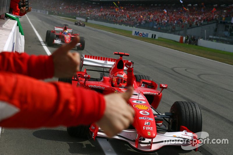 Race winner Michael Schumacher, Ferrari, second place Felipe Massa, Ferrari