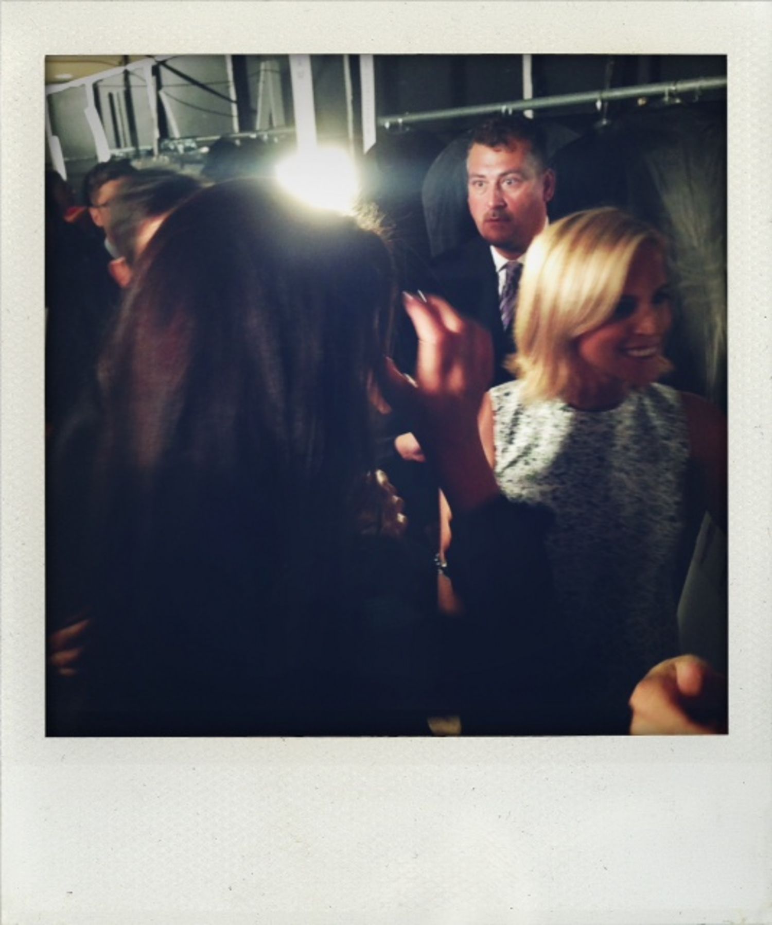 Image may contain Human Person Light Flare Interior Design Indoors Face Head Tie Accessories Accessory and Hair