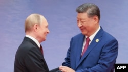 Russian President Vladimir Putin and Chinese President Xi Jinping in Tianjin, China, on August 31