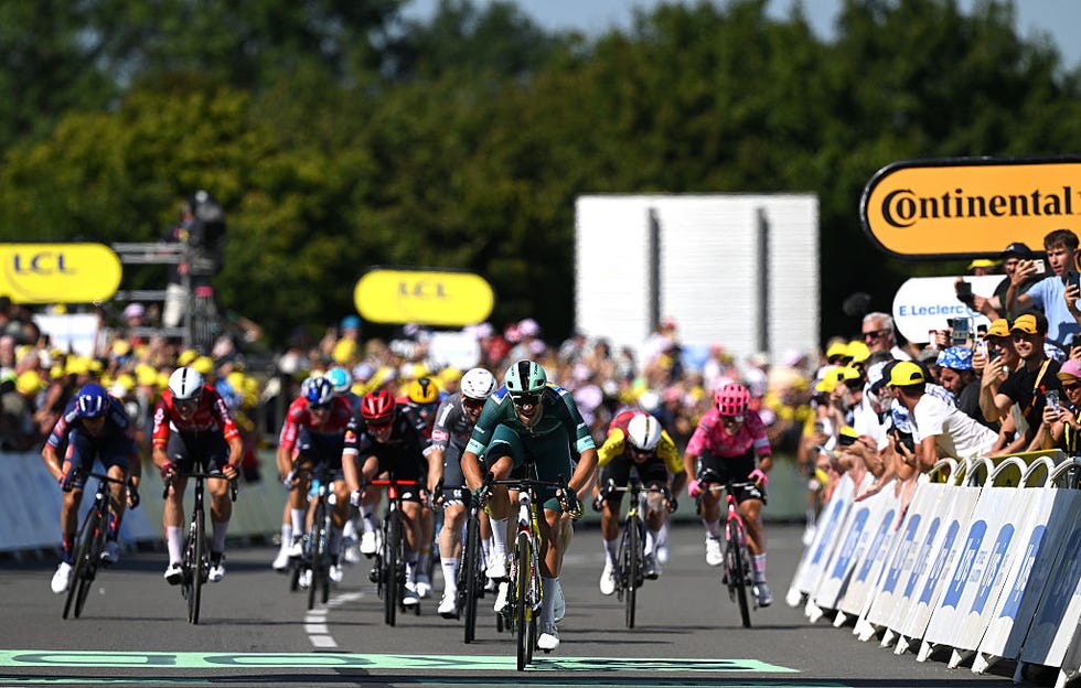 112th Tour de France - Stage 8 laval, france july 12: stage winner jonathan milan of italy and team lidl trek green sprint jersey sprints at finish line during the 112th tour de france, stage 8 a 197km stage from saint meen le grand to laval (espace mayenne) / #uciwt / on july 12, 2025 in laval, france. (photo by dario belingheri/getty images)