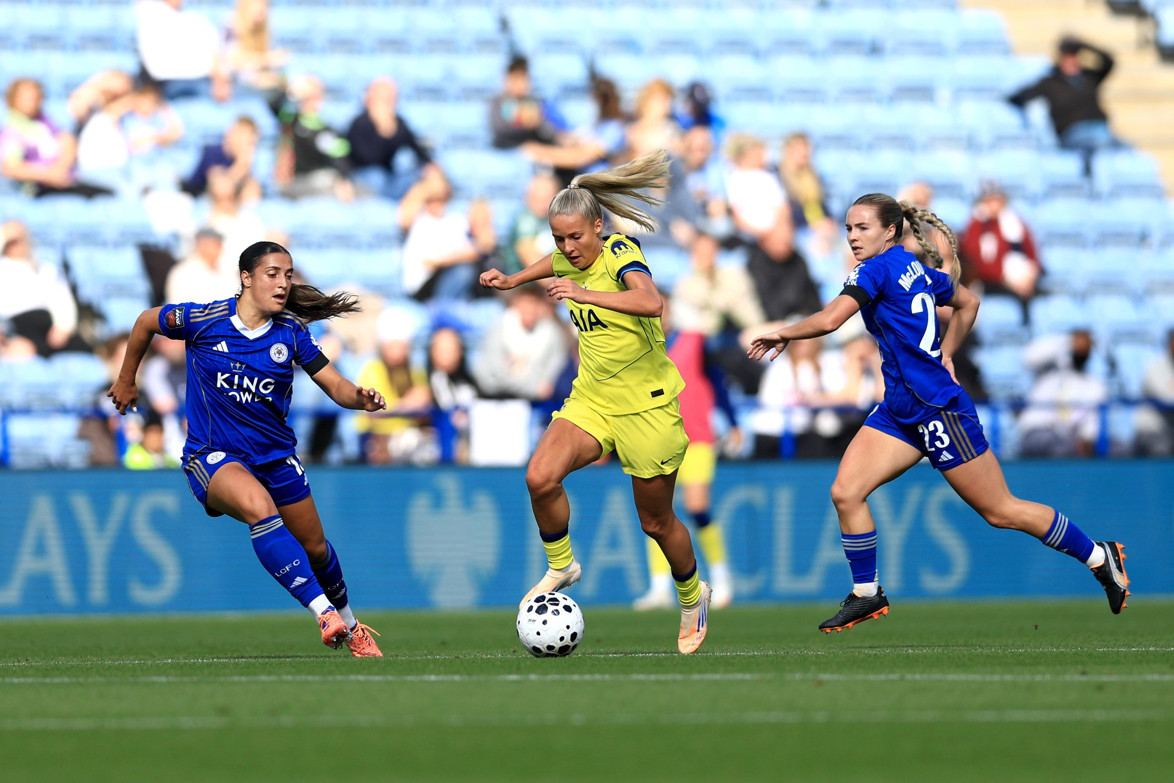 Olivia Holdt of Tottenham Hotspur runs with the ball during the game against Leicester City at King Power Stadium. 