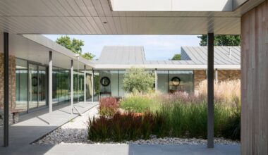 Nick Willson Architects lines Three Oaks Farm with steel-framed walkways