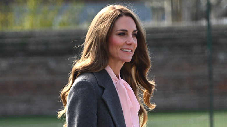 Closeup side profile of Princess Catherine walking