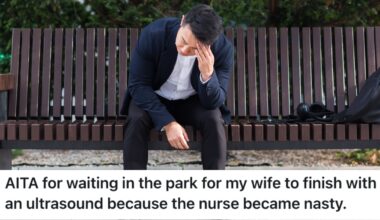 man sitting on a park bench
