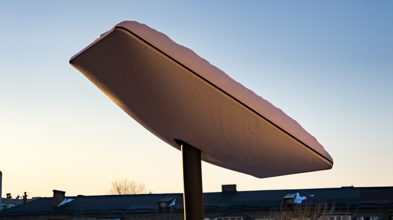 A Starlink satellite cover in snow
