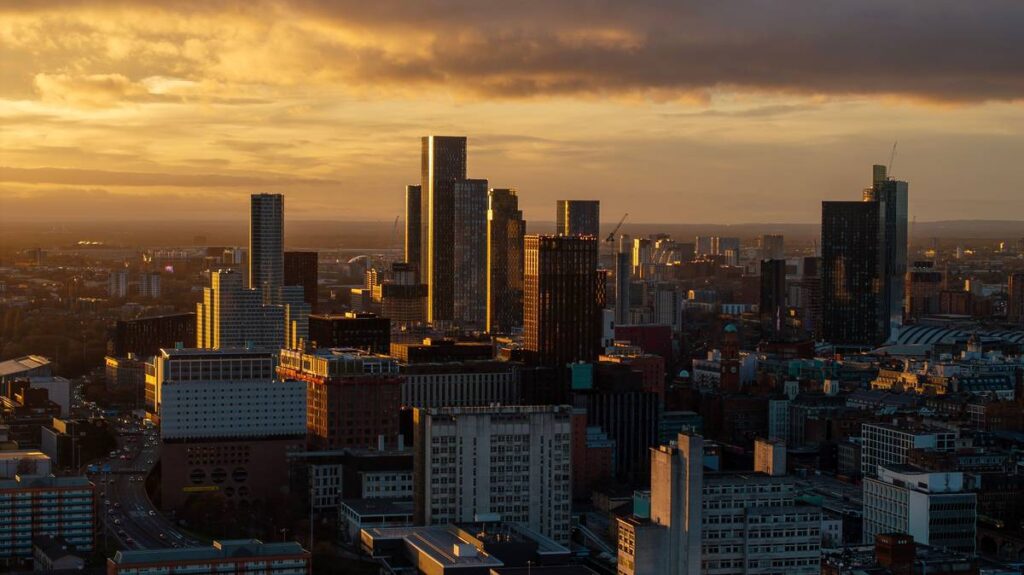 manchester skyline at sunset
