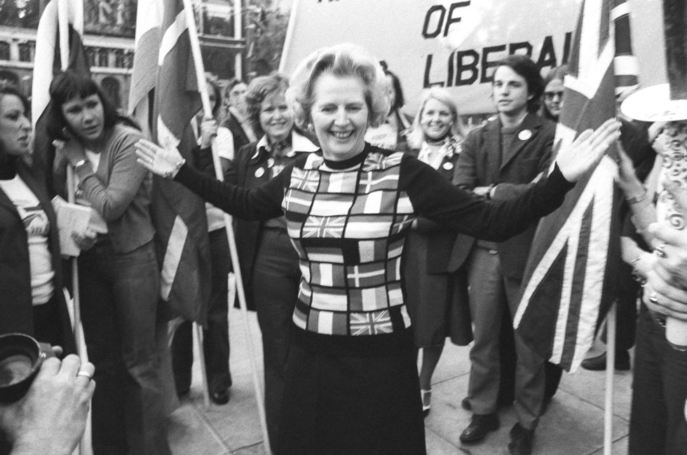 Margaret Thatcher, sporting a sweater bearing the flags of European nations, in Parliament Square during her 'Yes to Europe' campaign