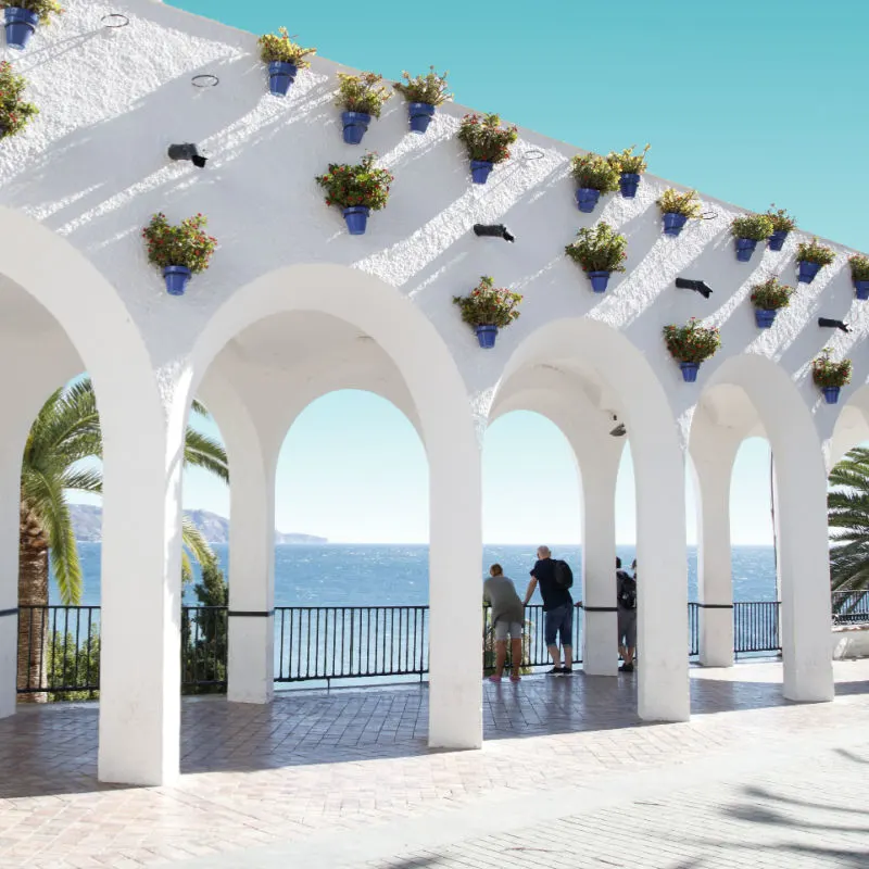 blue pots along the wall in nerja spain