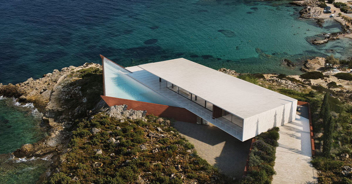summer residence's sharp geometry emerges from greek seaside slope