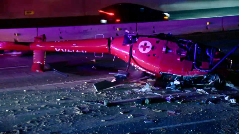 The helicopter could be seen lying upside down after the crash. Pic: NBC 