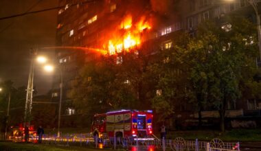 A block of flats in Kyiv caught fire after being hit. Pic: Reuters
